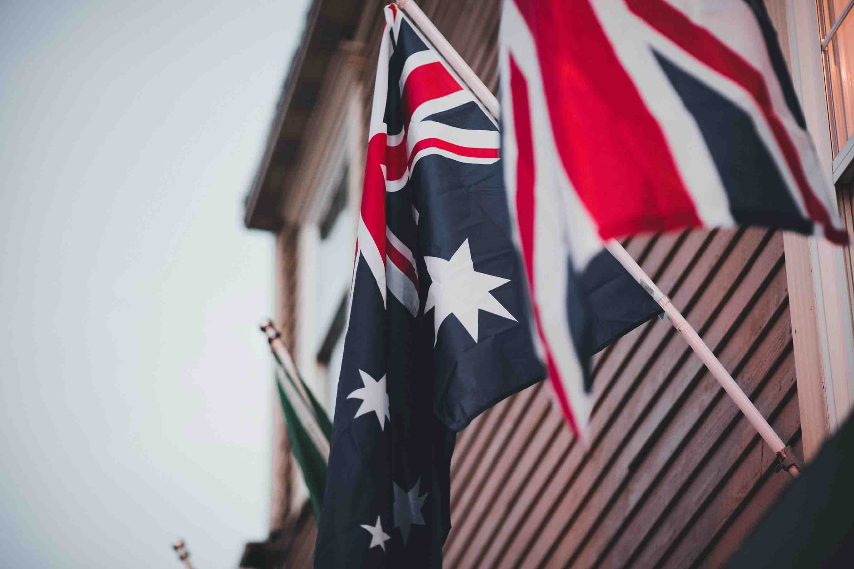 Australian flag flying alongside the Union Jack